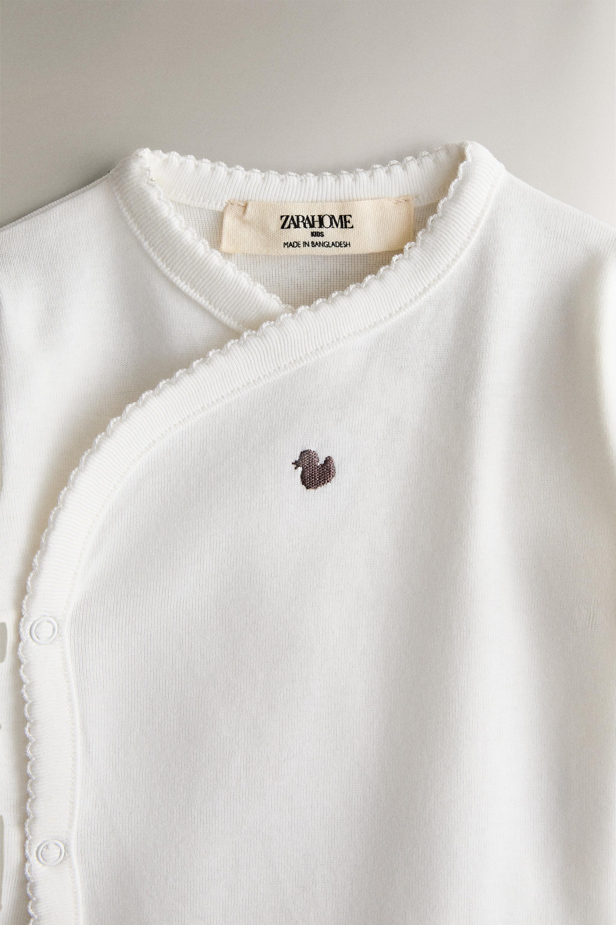 EMBROIDERED COTTON BODYSUIT SET (PACK OF 7)